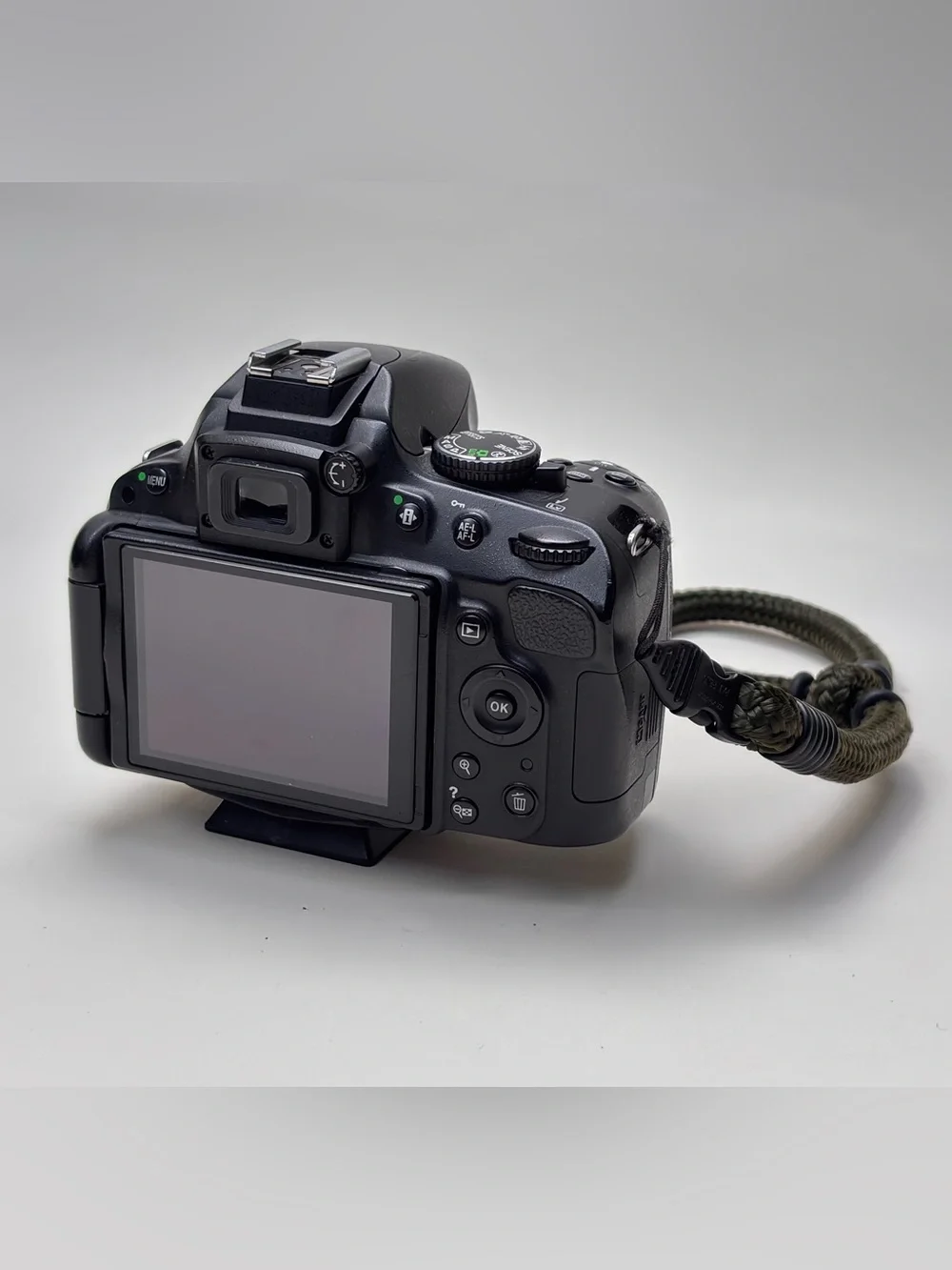 Nikon Black DSLR Camera Body with Black Lenses and Accessories